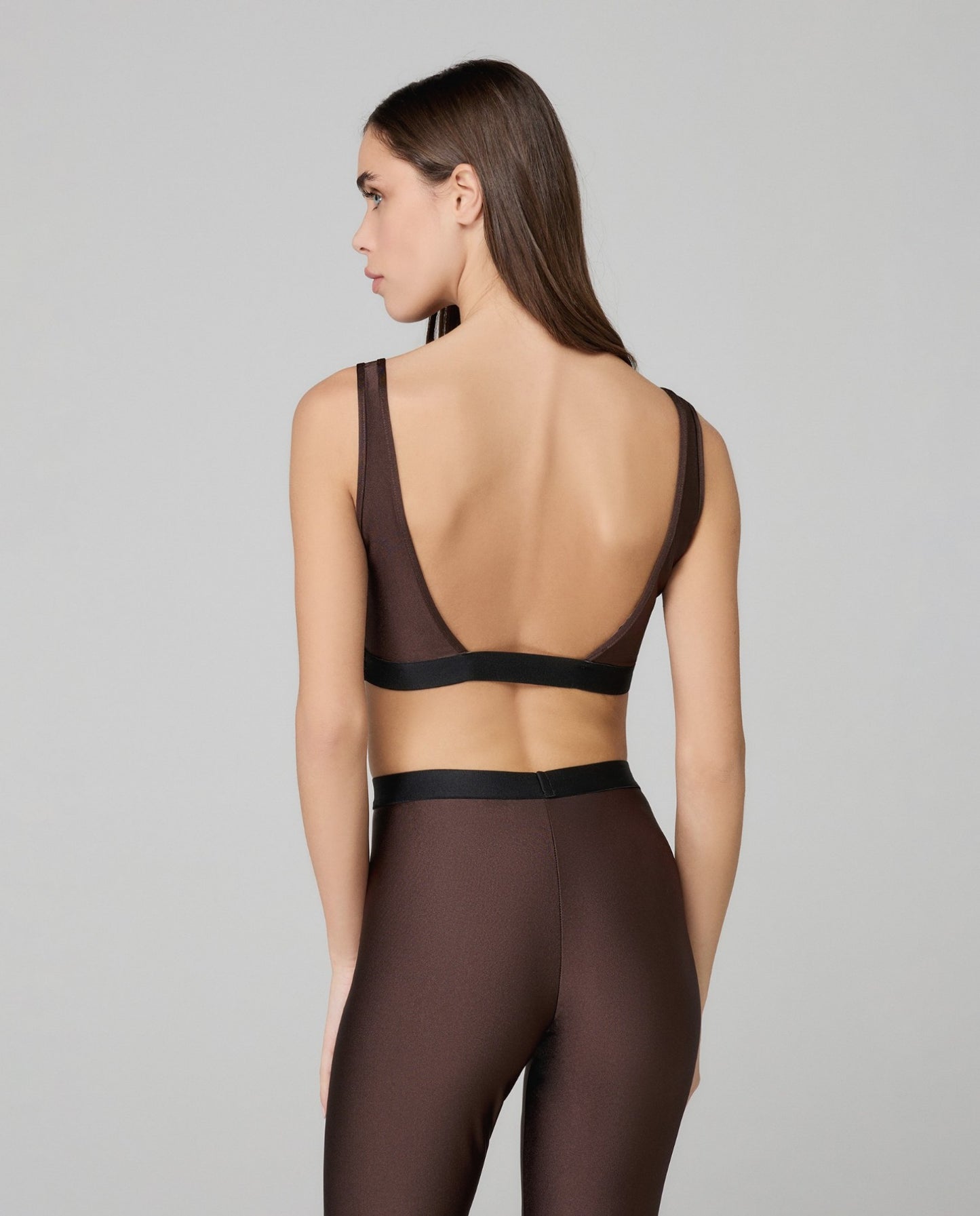 Top In Lycra Lucida Con Elastico Logato In Contrasto HINNOMINATE art. HMABW02022 colore bordeaux e marrone